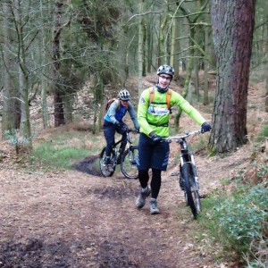 Andrew walks bike