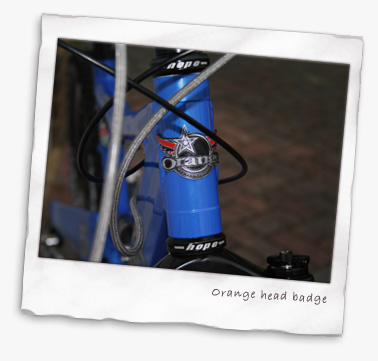Orange Five head badge