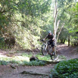 Garry jumping in the woods